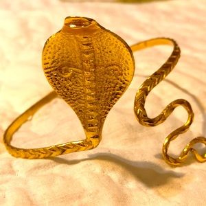 Cobra upper arm bracelet.